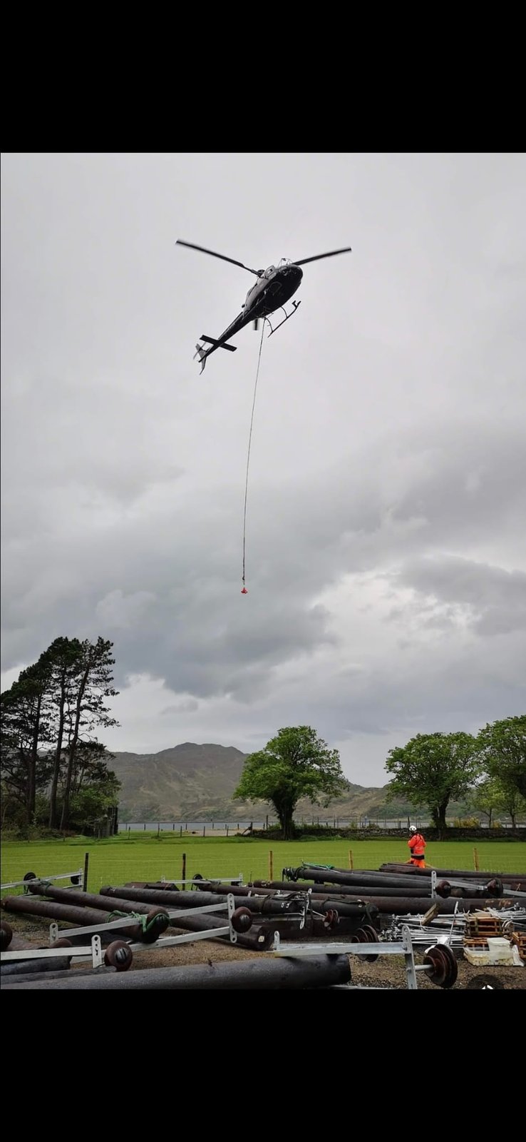 Helicopter pole delivery in highlands